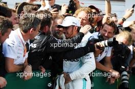 Race winner Lewis Hamilton (GBR) Mercedes AMG F1 celebrates with the team in parc ferme. 04.08.2019. Formula 1 World Championship, Rd 12, Hungarian Grand Prix, Budapest, Hungary, Race Day.