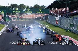 (L to R): Max Verstappen (NLD) Red Bull Racing RB15; Valtteri Bottas (FIN) Mercedes AMG F1 W10; and Lewis Hamilton (GBR) Mercedes AMG F1 W10, at the start of the race. 04.08.2019. Formula 1 World Championship, Rd 12, Hungarian Grand Prix, Budapest, Hungary, Race Day.