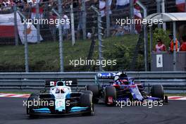 George Russell (GBR) Williams Racing FW42 and Daniil Kvyat (RUS) Scuderia Toro Rosso STR14. 04.08.2019. Formula 1 World Championship, Rd 12, Hungarian Grand Prix, Budapest, Hungary, Race Day.