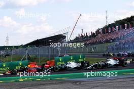 Max Verstappen (NLD) Red Bull Racing RB15 leads Valtteri Bottas (FIN) Mercedes AMG F1 W10 and Lewis Hamilton (GBR) Mercedes AMG F1 W10 at the start of the race. 04.08.2019. Formula 1 World Championship, Rd 12, Hungarian Grand Prix, Budapest, Hungary, Race Day.
