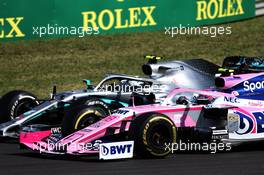 Valtteri Bottas (FIN) Mercedes AMG F1 W10 and Lance Stroll (CDN) Racing Point F1 Team RP19 battle for position. 04.08.2019. Formula 1 World Championship, Rd 12, Hungarian Grand Prix, Budapest, Hungary, Race Day.