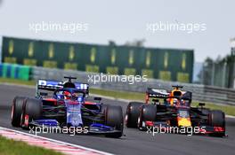 Daniil Kvyat (RUS) Scuderia Toro Rosso STR14 and Max Verstappen (NLD) Red Bull Racing RB15. 03.08.2019. Formula 1 World Championship, Rd 12, Hungarian Grand Prix, Budapest, Hungary, Qualifying Day.