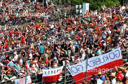 Circuit atmosphere - fans in the grandstand and flags for Robert Kubica (POL) Williams Racing. 03.08.2019. Formula 1 World Championship, Rd 12, Hungarian Grand Prix, Budapest, Hungary, Qualifying Day.