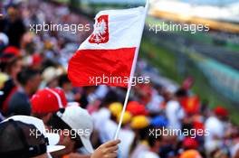 Circuit atmosphere fans in the grandstand and a Polish flag. 03.08.2019. Formula 1 World Championship, Rd 12, Hungarian Grand Prix, Budapest, Hungary, Qualifying Day.