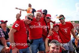 Circuit atmosphere - Ferrari fans in the grandstand. 03.08.2019. Formula 1 World Championship, Rd 12, Hungarian Grand Prix, Budapest, Hungary, Qualifying Day.