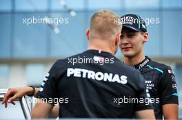 George Russell (GBR) Williams Racing with Valtteri Bottas (FIN) Mercedes AMG F1 on the drivers parade. 04.08.2019. Formula 1 World Championship, Rd 12, Hungarian Grand Prix, Budapest, Hungary, Race Day.
