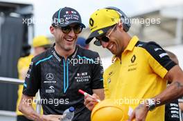 (L to R): Robert Kubica (POL) Williams Racing with Daniel Ricciardo (AUS) Renault F1 Team on the drivers parade. 04.08.2019. Formula 1 World Championship, Rd 12, Hungarian Grand Prix, Budapest, Hungary, Race Day.