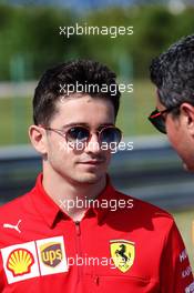 (L to R): Charles Leclerc (MON) Ferrari with Michael Masi (AUS) FIA Race Director. 01.08.2019. Formula 1 World Championship, Rd 12, Hungarian Grand Prix, Budapest, Hungary, Preparation Day.