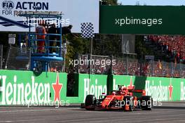 Race winner Charles Leclerc (MON) Ferrari SF90 takes the chequered flag at the end of the race. 08.09.2019. Formula 1 World Championship, Rd 14, Italian Grand Prix, Monza, Italy, Race Day.