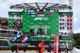 The podium (L to R): Valtteri Bottas (FIN) Mercedes AMG F1, second; Charles Leclerc (MON) Ferrari, race winner; Lewis Hamilton (GBR) Mercedes AMG F1 third. 08.09.2019. Formula 1 World Championship, Rd 14, Italian Grand Prix, Monza, Italy, Race Day.