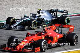Race winner Charles Leclerc (MON) Ferrari SF90 celebrates at the end of the race with Valtteri Bottas (FIN) Mercedes AMG F1 W10. 08.09.2019. Formula 1 World Championship, Rd 14, Italian Grand Prix, Monza, Italy, Race Day.