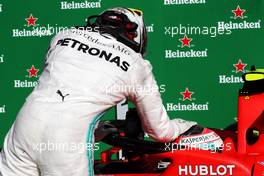 Race winner Charles Leclerc (MON) Ferrari SF90 is congratulated by third placed Lewis Hamilton (GBR) Mercedes AMG F1 in parc ferme. 08.09.2019. Formula 1 World Championship, Rd 14, Italian Grand Prix, Monza, Italy, Race Day.