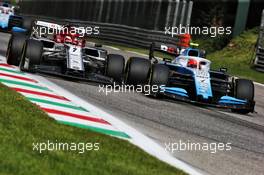 Robert Kubica (POL) Williams Racing FW42 and Kimi Raikkonen (FIN) Alfa Romeo Racing C38 battle for position. 08.09.2019. Formula 1 World Championship, Rd 14, Italian Grand Prix, Monza, Italy, Race Day.