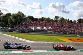 Max Verstappen (NLD) Red Bull Racing RB15 leads Pierre Gasly (FRA) Scuderia Toro Rosso STR14. 08.09.2019. Formula 1 World Championship, Rd 14, Italian Grand Prix, Monza, Italy, Race Day.