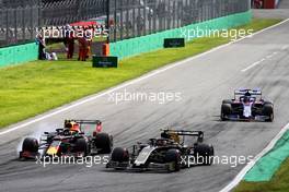 Alexander Albon (THA) Red Bull Racing RB15 and Kevin Magnussen (DEN) Haas VF-19 battle for position. 08.09.2019. Formula 1 World Championship, Rd 14, Italian Grand Prix, Monza, Italy, Race Day.