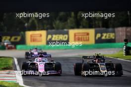 Sergio Perez (MEX) Racing Point F1 Team RP19 and Kevin Magnussen (DEN) Haas VF-19 battle for position. 08.09.2019. Formula 1 World Championship, Rd 14, Italian Grand Prix, Monza, Italy, Race Day.