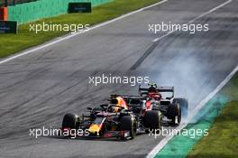 Max Verstappen (NLD) Red Bull Racing RB15 and Antonio Giovinazzi (ITA) Alfa Romeo Racing C38 battle for position. 08.09.2019. Formula 1 World Championship, Rd 14, Italian Grand Prix, Monza, Italy, Race Day.