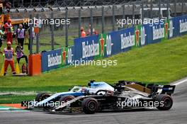 George Russell (GBR) Williams Racing FW42 and Romain Grosjean (FRA) Haas F1 Team VF-19 battle for position. 08.09.2019. Formula 1 World Championship, Rd 14, Italian Grand Prix, Monza, Italy, Race Day.