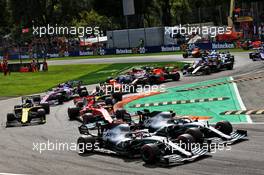 Lewis Hamilton (GBR) Mercedes AMG F1 W10 and Valtteri Bottas (FIN) Mercedes AMG F1 W10 at the start of the race. 08.09.2019. Formula 1 World Championship, Rd 14, Italian Grand Prix, Monza, Italy, Race Day.