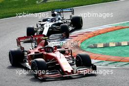 Charles Leclerc (MON) Ferrari SF90 leads Lewis Hamilton (GBR) Mercedes AMG F1 W10. 08.09.2019. Formula 1 World Championship, Rd 14, Italian Grand Prix, Monza, Italy, Race Day.