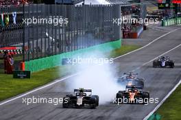 Kevin Magnussen (DEN) Haas VF-19 and Lando Norris (GBR) McLaren MCL34 battle for position. 08.09.2019. Formula 1 World Championship, Rd 14, Italian Grand Prix, Monza, Italy, Race Day.