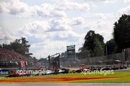 Charles Leclerc (MON) Ferrari SF90 leads at the start of the race. 08.09.2019. Formula 1 World Championship, Rd 14, Italian Grand Prix, Monza, Italy, Race Day.