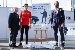 (L to R): Jean Todt (FRA) FIA President with Charles Leclerc (MON) Ferrari and Didier Drogba (CIV) Former Football Player, at an FIA Road Safety Campaign. 07.09.2019. Formula 1 World Championship, Rd 14, Italian Grand Prix, Monza, Italy, Qualifying Day.