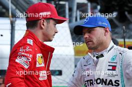 (L to R): Charles Leclerc (MON) Ferrari in qualifying parc ferme with Valtteri Bottas (FIN) Mercedes AMG F1. 07.09.2019. Formula 1 World Championship, Rd 14, Italian Grand Prix, Monza, Italy, Qualifying Day.