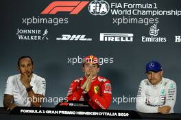 Qualifying top three in the FIA Press Conference (L to R): Lewis Hamilton (GBR) Mercedes AMG F1, second; Charles Leclerc (MON) Ferrari, pole position; Valtteri Bottas (FIN) Mercedes AMG F1, third. 07.09.2019. Formula 1 World Championship, Rd 14, Italian Grand Prix, Monza, Italy, Qualifying Day.