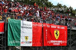 Circuit atmosphere - Ferrari flags and fans in the grandstand. 07.09.2019. Formula 1 World Championship, Rd 14, Italian Grand Prix, Monza, Italy, Qualifying Day.