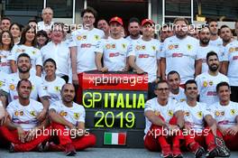 Mattia Binotto (ITA) Ferrari Team Principal; Charles Leclerc (MON) Ferrari; and Sebastian Vettel (GER) Ferrari, at a 90th anniversary team photograph. 07.09.2019. Formula 1 World Championship, Rd 14, Italian Grand Prix, Monza, Italy, Qualifying Day.