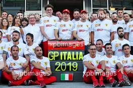 Mattia Binotto (ITA) Ferrari Team Principal; Charles Leclerc (MON) Ferrari; and Sebastian Vettel (GER) Ferrari, at a 90th anniversary team photograph. 07.09.2019. Formula 1 World Championship, Rd 14, Italian Grand Prix, Monza, Italy, Qualifying Day.