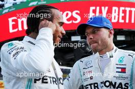 (L to R): Lewis Hamilton (GBR) Mercedes AMG F1 with Valtteri Bottas (FIN) Mercedes AMG F1 in qualifying parc ferme. 07.09.2019. Formula 1 World Championship, Rd 14, Italian Grand Prix, Monza, Italy, Qualifying Day.