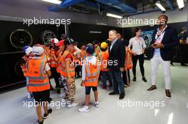 Jean Todt (FRA) FIA President with grid kids on the drivers parade. 08.09.2019. Formula 1 World Championship, Rd 14, Italian Grand Prix, Monza, Italy, Race Day.
