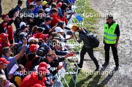Lando Norris (GBR) McLaren signs autographs for the fans. 08.09.2019. Formula 1 World Championship, Rd 14, Italian Grand Prix, Monza, Italy, Race Day.