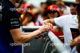 Pierre Gasly (FRA) Scuderia Toro Rosso signs autographs for the fans. 05.09.2019. Formula 1 World Championship, Rd 14, Italian Grand Prix, Monza, Italy, Preparation Day.