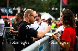 Valtteri Bottas (FIN) Mercedes AMG F1 signs autographs for the fans. 05.09.2019. Formula 1 World Championship, Rd 14, Italian Grand Prix, Monza, Italy, Preparation Day.