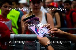 Lance Stroll (CDN) Racing Point F1 Team signs autographs for the fans. 05.09.2019. Formula 1 World Championship, Rd 14, Italian Grand Prix, Monza, Italy, Preparation Day.