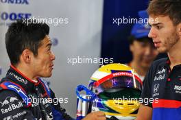 (L to R): Naoki Yamamoto (JPN) Scuderia Toro Rosso with Pierre Gasly (FRA) Scuderia Toro Rosso. 11.10.2019. Formula 1 World Championship, Rd 17, Japanese Grand Prix, Suzuka, Japan, Practice Day.