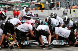 Lewis Hamilton (GBR) Mercedes AMG F1 W10 practices a pit stop. 11.10.2019. Formula 1 World Championship, Rd 17, Japanese Grand Prix, Suzuka, Japan, Practice Day.