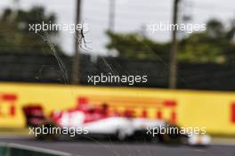 Kimi Raikkonen (FIN) Alfa Romeo Racing C38 passing a spider. 11.10.2019. Formula 1 World Championship, Rd 17, Japanese Grand Prix, Suzuka, Japan, Practice Day.