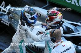 Race winner Valtteri Bottas (FIN) Mercedes AMG F1 W10 celebrates in parc ferme with team mate Lewis Hamilton (GBR) Mercedes AMG F1. 13.10.2019. Formula 1 World Championship, Rd 17, Japanese Grand Prix, Suzuka, Japan, Sunday.