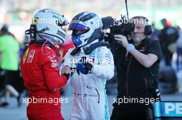 Race winner Valtteri Bottas (FIN) Mercedes AMG F1 celebrates in parc ferme with second placed Sebastian Vettel (GER) Ferrari. 13.10.2019. Formula 1 World Championship, Rd 17, Japanese Grand Prix, Suzuka, Japan, Sunday.