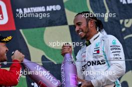 Lewis Hamilton (GBR) Mercedes AMG F1 celebrates his third position on the podium with Sebastian Vettel (GER) Ferrari. 13.10.2019. Formula 1 World Championship, Rd 17, Japanese Grand Prix, Suzuka, Japan, Sunday.