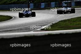 (L to R): Sergio Perez (MEX) Racing Point F1 Team RP19 and George Russell (GBR) Williams Racing FW42. 13.10.2019. Formula 1 World Championship, Rd 17, Japanese Grand Prix, Suzuka, Japan, Sunday.
