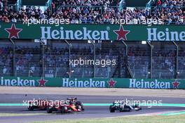 Max Verstappen (NLD) Red Bull Racing RB15 and Charles Leclerc (MON) Ferrari SF90 make contact at the start of the race. 13.10.2019. Formula 1 World Championship, Rd 17, Japanese Grand Prix, Suzuka, Japan, Sunday.