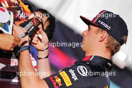 Max Verstappen (NLD) Red Bull Racing signs autographs for the fans. 13.10.2019. Formula 1 World Championship, Rd 17, Japanese Grand Prix, Suzuka, Japan, Sunday.