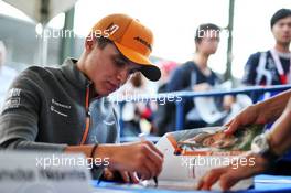 Lando Norris (GBR) McLaren signs autographs for the fans. 10.10.2019. Formula 1 World Championship, Rd 17, Japanese Grand Prix, Suzuka, Japan, Preparation Day.
