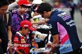 Sergio Perez (MEX) Racing Point F1 Team signs autographs for the fans. 10.10.2019. Formula 1 World Championship, Rd 17, Japanese Grand Prix, Suzuka, Japan, Preparation Day.