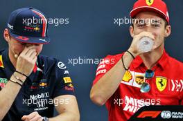 (L to R): Max Verstappen (NLD) Red Bull Racing with Charles Leclerc (MON) Ferrari in the FIA Press Conference. 10.10.2019. Formula 1 World Championship, Rd 17, Japanese Grand Prix, Suzuka, Japan, Preparation Day.